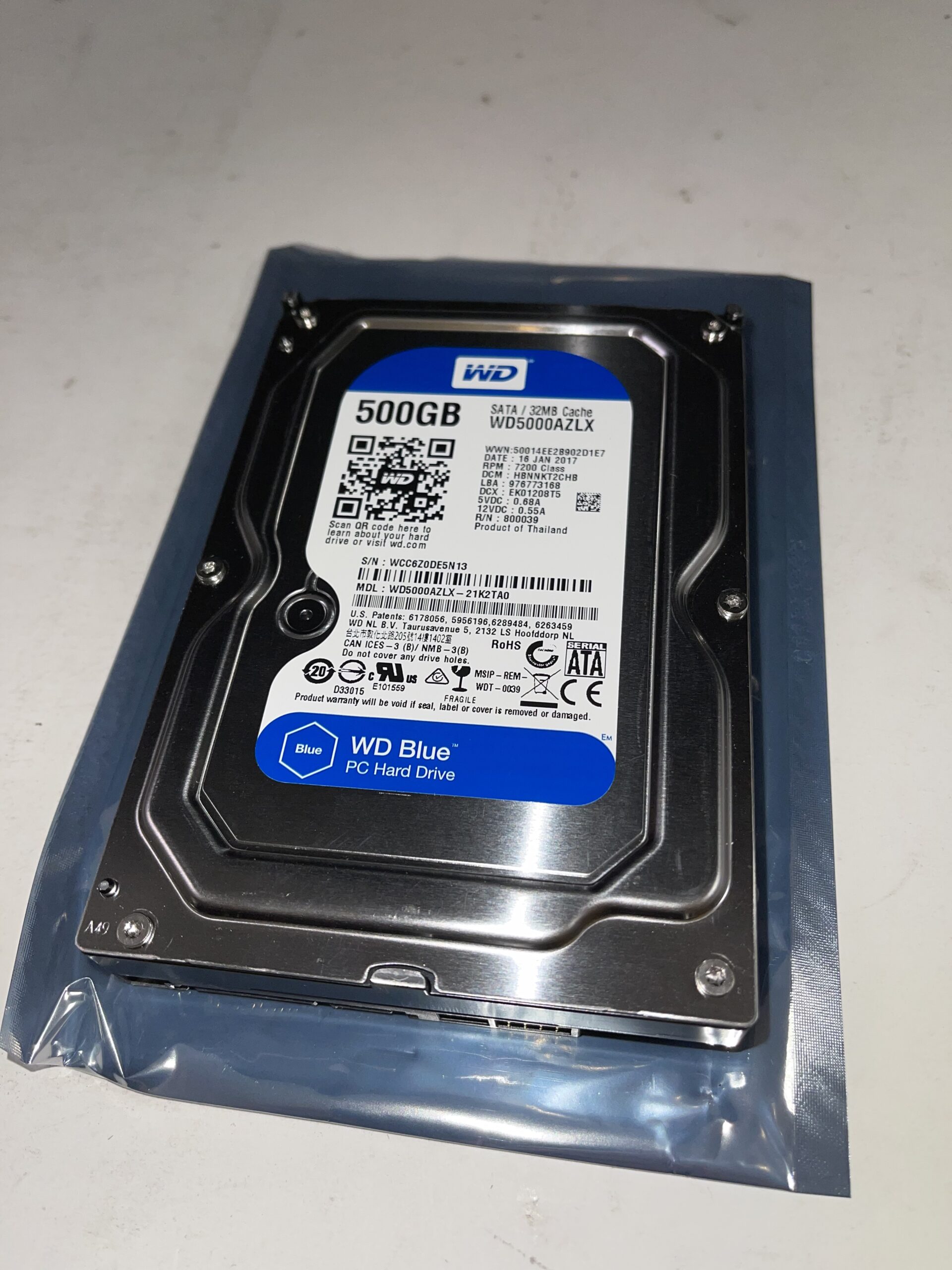 Western Digital 500GB 3.5" SATA Hard Drive front right view in a packet